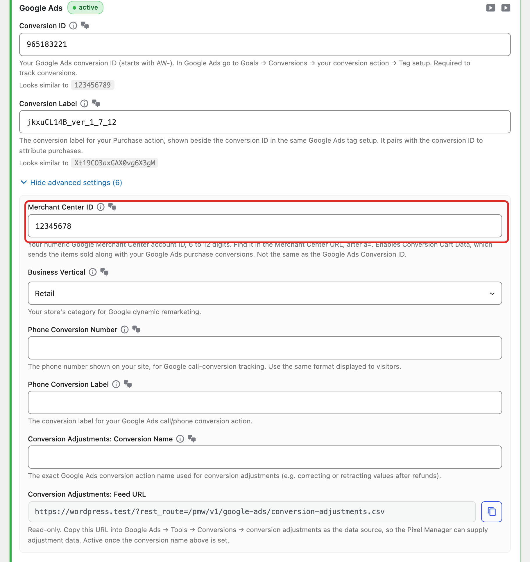 The advanced Google Ads settings, showing a complete Merchant Center ID field